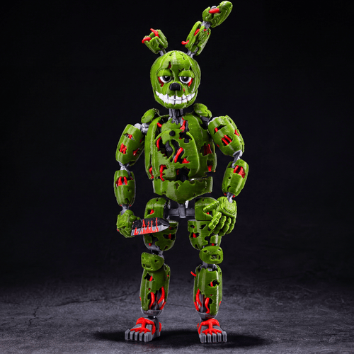 Green robot bunny figure with red accents on a dark background