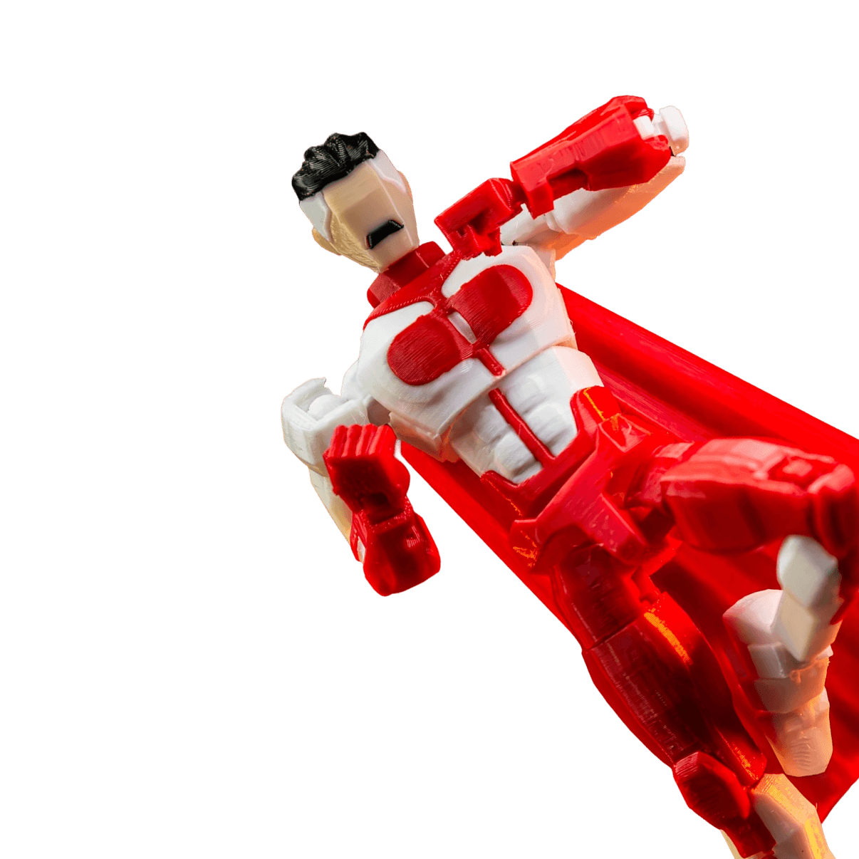 Toy figure in red and white on a black background